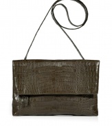 Invest in multi-season sophistication with Nancy Gonzalezs sleek fold-over croco clutch, an ultra luxurious choice in elegant army - Fold-over with hidden magnetic snaps and zippered pocket underneath, back slit pocket with magnetic closure, inside zippered back wall pocket, tonal suede lining, removable shoulder strap - Carry as a finish to chic day and evening looks alike