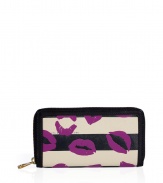 Detailed with a mash-up of bold graphic prints, Marc by Marc Jacobs stripey lips wallet is a fun choice for stashing away your everyday essentials - Metal zip-around closure, zippered change purse, multiple credit card slots, leather trim - Carry alone for running quick errands, or slip into a bright monochrome handbag