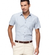 Get the trim, tailored look you like with this slim-fit shirt from Van Heusen.