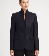 This crisp, sophisticated wool style is finished with a stand collar and unique inverted lapels.Stand collarInverted lapelsButton closureFlap pocketsButton cuffsBack ventAbout 26 from shoulder to hemWoolDry cleanMade in Italy of imported fabricModel shown is 5'11 (180cm) wearing US size 4. Additional Information Women's Premier Designer & Contemporary Size Guide 