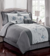 Trailing vines. Gorgeous embroidered florals cascade upon a cool gray landscape in this Regis Vine comforter set for a peaceful ambiance in your space.