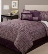 An intense purple palette commingles with a modern geometric design and subtle stripes to lend an air of sophistication to the bedroom in this jacquard woven Westcott comforter set.