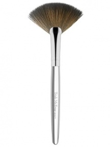 The latest addition to Trish's iconic collection of handcrafted makeup artistry brushes, the flat, arched shape and fine edge of Brush 62 Fan is precision-cut to deposit a whisper of color along the features, a veil of finishing powder to the under-eye, or as a tool to gently fan away fallout for a perfect finish. 