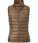 Lightweight and stylish, this quilted down Vest will keep you looking chic from season-to-season - Stand collar with snap detail, front zip closure, zip pockets, all-over quilt detail - Pair with jeans, wide leg trousers, or a mini-dress with ribbed tights