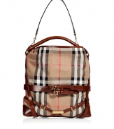 Detailed in the house check with dark tan leather trim, Burberry Londons canvas hobo is an iconic multi-season must for timeless-classic looks - Leather hobo strap, removable belted shoulder strap, wrap-around leather belted straps with engraved logo plaque, two internal sections with a zippered middle pocket, inside back wall zippered pocket, protective feet - Carry as a sophisticated compliment to polished daytime looks