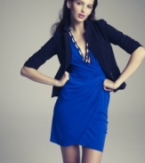 Dress up a sheath or wrap dress with this sleek blazer by Eliza J.