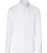 Elegant button down in fine, crisp white cotton - Modern, ultra-slim cut - Fitted torso with a chic, pleated button placket - Small collar and decorative cuffs - Sleek darts at back accentuate a narrow silhouette - A fresh take on classic cool, easily dressed up or down - Pair with jeans, chinos or dress trousers and a blazer or pullover