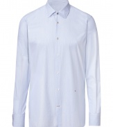 Elegant dress shirt in fine, pure cotton - Elegant pale blue pin stripe - Classic button down style with small collar and long, cuffed sleeves - Modern silhouette is lean and streamlined - Discreet red logo embroidery detail - A polished classic in any wardrobe ideal for both work and play - Dress up with a suit, or go for a more casual look with slim denim and a blazer or leather jacket