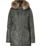 Detailed with a soft surface sheen and luxe raccoon fur trim, Woolrichs Arctic down parka is a must for contemporary cool weather looks - Hood with raccoon fur trim, long sleeves, fitted ribbed knit cuffs, hidden two-way front zip, button placket with snaps at hemline, buttoned front flap pockets - Contemporary fit, slight A-line silhouette - A versatile, classic coat perfect for both city streets and country slopes