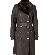 Luxury and warmth come together in this exquisitely chic lamb shearling coat from Burberry Brit - Peaked lapel, long sleeves, belted cuffs, buttoned epaulettes, buttoned pockets, double-breasted button-down front, gun flap, belted waistline, antique brass-toned hardware, rain shield, back vent - Tailored fit - Wear with everything from jeans to tailored dresses