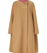 A pristine example of the contemporary Jil Sander look, this soft camel wool coat is a statement must-have for modern-minimalist wardrobes - collarless, seamed long dolman sleeves, hidden front snaps, side slit pockets, rose unlined interior - Oversized flared retro silhouette - Team with monochrome separates and jet black accessories