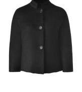 Luxurious jacket in fine black sheepskin - Tremendously classy and feminine - Slim, short cut with a stand collar and fashionable 3/4 sleeves - Can be worn on both sides - A dream of a jacket that looks glamorous, chic and casual at the same time - A wintry new basic you can wear with virtually everything - Trendy with skinny pants, fashionable with maxi skirts, elegant with pencil skirts