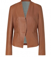 Luxe blazer in supple caramel leather - Both incredibly elegant and relaxed, on-trend and effortlessly cool - Slim silhouette tapers at waist, hits just below hip - V neck, single-welt front pockets, grey fabric lining - Great for both day and evening, in the office or after work - Pair with maxi skirts, jeans or classic trousers