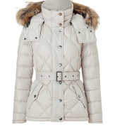 Ultra-luxe and undeniably stylish, this fitted down jacket from Burberry Brit will elevate any cold weather look - Stand collar with snaps, concealed zip closure, snap front placket, hood with raccoon fur trim, long sleeves, quilted, flap pockets with snaps, belted waist, fitted silhouette - Style with skinny jeans, a cashmere cardigan, and over-the-knee boots