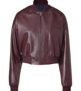 With a classic retro-inspired silhouette and a chic cropped fit, this luxe leather bomber from Jil Sander is a new season essential - Stand collar, front zip closure, long sleeves, welt pockets, elasticized hem and cuffs - Cropped silhouette - Pair with high-waisted skinnies and booties, or go casual cool with sporty separates and favorite fashion sneakers