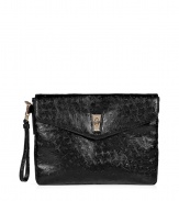 Show your tablet a little love with this sleek and sophisticated black case from Marc by Marc Jacobs - Allover ostrich embossed detail - Envelope clutch style with removable wristlet - Front flap with gold-tone turnlock closure - Fully lined, graphic print interior - Ultra-durable PVC material protects against dust, scratches and moisture  - Ideal for work, play or anytime youre on the go