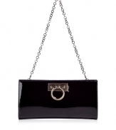 Inimitable Italian craftsmanship meets classic elegance with Salvatore Ferragamos luxurious patent leather Norina clutch - Traditional envelope shape with a detachable chain link handle and silver Gancio bit accent - Magnetic closure and satin lining - Single interior open pocket - Perfect for parties and cocktails and roomy enough to fit all of the evening essentials - Height: 4.75 - Width: 9 - Depth: 1.25 - Made in Italy