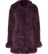 Exquisitely soft and equally luxurious, Matthew Williamsons rabbit fur coat is a glamorous investment tailored to multi-season sophistication - Collarless with fox fur trim, long sleeves, fox fur cuffs, hidden front hook closures - Long fitted silhouette - Pair with edgy leather separates and a finish of statement accessories