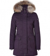 Your cold weather look just got more stylish with this luxe fitted down parka from Peuterey - Hood with raccoon fur trim, concealed zipper closure, long sleeves with zip cuffs logo detail, cargo pockets and slit pockets, water repellent - Slim fit - Wear with an elevated jeans-and-tee ensemble or a workweek-chic look