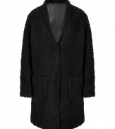 Boucle coat of a black wool blend - The cut is relaxed, with deep lapels and large patch pockets - Comfortable length to thigh - Wear with business suits, leather pants, pencil skirts, and even jeans