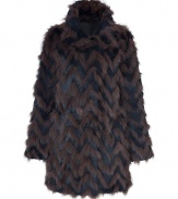 Take a show-stopping stance on chic winter style in Antik Batiks two-tone fur coat, detailed in dramatic contrasting rabbit and fox for ultra luxurious results guaranteed to make an impact - Spread collar, long sleeves, hidden front hook closures, side slit pockets - Contemporary straight fit, hits at the knee - Pair with form-fitting separates and edgy statement accessories