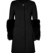 Ultra-elegant coat in high-quality wool and cashmere blend - Features fox fur sleeves for an added element of luxury - Slim, tailored silhouette is slightly flared - Features round neck, hidden button placket, side pockets and back half-belt - Pair with cocktail dresses at your next special event