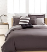 Clean, casual & comfortable. The Solid Grey Brushed Twill duvet cover set from Lacoste is essential to any well-dressed bed. Brushed twill fabric and over-sized buttoned accents create a classic, preppy look. Button closure.