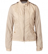 Stylish jacket in fine, cream nylon (shell) and cotton (lining) - A sporty standout from Italian it-label Duvetica - Slim silhouette tapers at waist, crops just below hips - Small standup collar, epaulets and two-way zipper - Long, cuffed sleeves and kangaroo snap pockets - Elegantly relaxed and ideal for everyday - Pair with chinos, jeans and casual skirts