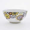 From the fashion house of Missoni, Margherita bone china is decorated with multicolor kaleidoscopic flowers.