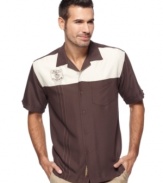 Smooth operator. With a contrasting duo of hues, this Cubavera shirt has unsurpassed cool.