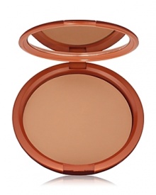 Give yourself a heavenly glow with this silky, luxurious powder bronzer. Unique oil-control complex keeps skin shine-free and comfortable. Smooth, oil-free powder is perfect for giving face, shoulders and decolletage a healthy bronze look. Sweep on all over to enhance existing color or to create the look of a fabulous tan.