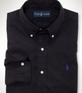 A trim-fitting sport shirt is woven from crisp cotton and adorned with Ralph Lauren's embroidered pony for added polish.