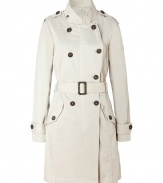 This edgy-cool trench brings a modern approach to a classic wardrobe staple - Double-breasted cut, epaulets, belted waist, flap pockets, back slit - Style with high-waisted skinny jeans, a bright sweater, and wedge booties