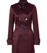 The classic trench gets a high style update from Burberry London with a wine-hued satin fabrication and a flattering slim fit - Spread collar, epaulets, long sleeves with belted cuffs, front button placket, double-breasted, button flap detail at shoulders - Belted waist, flap pockets, buttoned back yoke, back vent - Wear with an elevated jeans-and-tee ensemble or a cocktail look