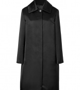 With its dressy luster and exquisite silk sateen, Jil Sanders jet black coat adds an immaculate polish to any outfit - Oversized spread collar, long sleeves, hidden snapped front, side slit pockets, back pleat, off-center vent - Straight silhouette, modern tailored fit - Wear with streamlined accessories and minimalist dresses