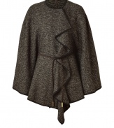 Rich, textured knits take a sophisticated turn with Etros sumptuous, clay-hued wool and silk poncho - Elegantly mottled tweed compliments the chocolate leather piping - Easy fit, with a round neck, decorative draped front and tie-cinched waist - Truly versatile and elegant, ideal for pairing with everything from jeans and a light pullover to a leather skirt and button down blouse