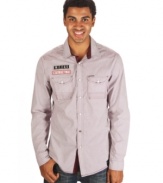 This Marc Ecko Cut & Sew button down has a cool gas patch and stylish snap closure sure to get your motor going.