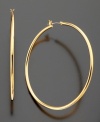 Look party-pretty with these glam hoop earrings crafted in goldtone mixed metal by Lauren by Ralph Lauren. Approximate diameter: 2 inches.