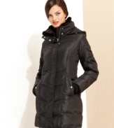 Sleek and chic, MICHAEL Michael Kors' puffer features a collar with sumptuous faux fur!