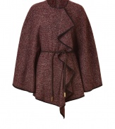 Rich, textured knits take a sophisticated turn with Etros sumptuous, claret-hued wool and silk poncho - Elegantly mottled tweed compliments the chocolate leather piping - Easy fit, with a round neck, decorative draped front and tie-cinched waist - Truly versatile and elegant, ideal for pairing with everything from jeans and a light pullover to a leather skirt and button down blouse