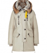 Whether youre hitting the city or the slopes this season, Parajumperss sand down parka is a sporty-luxe cold-weather essential - Water- and wind-resistant outer has an elegant, light sheen - Slim cut style hits mid-thigh - Full zip and supplementary button placket - Elbow patches and decorative contrast yellow trim - Raccoon-trimmed hood features a rabbit lining -  Two vertical flap pockets at chest, two oversize flap pockets at hips and single skinny pocket with drawstring - Fashionable and functional, a stylish must for all casual winter looks