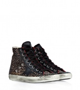 Luxe with a retro edge, these leopard print high-top sneakers from Golden Goose will kick your style into high gear - Round toe, lace up style, side star detail, exposed side-zip closure, stylishly distressed, contrasting rubber sole, back distressed leather stripe - Ankle height - Pair with oversized knits and skinnies, or casual tees and mini-skirts