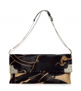 This luxurious clutch will imbue your evening look with fashion-forward elegance - Classic envelope shape, slim leather strap, all-over print, gold-told front framing detail - Pair with an evening dress or tuxedo pants with a sequin top and platform pumps