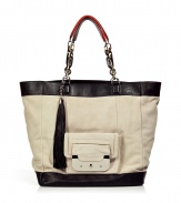 Bring instant glamour to your look with this luxe shoulder bag from Diane von Furstenberg - Large tote style, suede with leather accents, small front flap pocket with silver-tone lock closure, chain-detailed handles with leather accents, tassel charm detail - Pair with a chic office ensemble or a jetset-ready look