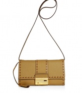 Easy-to-style and ultra chic, this Michael Kors clutch will take your style effortlessly from day-to-night - Envelope shape, stitched trim, gold-tone lock closure with logo, leather key charm - Perfect for early evening cocktails or a casual date look