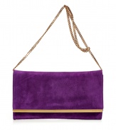 Classic with a modern twist, this luxe suede clutch from Emilio Pucci will pair effortlessly with your cocktail-ready looks - Classic envelope shape, front flap with gold-toned logo hardware trim and chain shoulder strap - Wear with a cocktail-ready frock, sky-high heels, and a statement ring