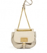 Enviable Marc Jacobs shoulder bag in fine cream-colored leather - A modern classic with a cool, bulbous shape, gold-colored chain strap, flap closure and gold-colored logo plaque - Convenient cross-body option - Thoughtful interior compartments for excellent organization - Favorite, functional bag for everyday