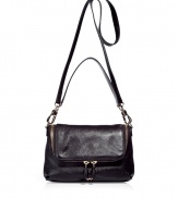 Edgy-cool zip details and super shiny leather add a downtown-ready attitude to this versatile bag from cult-favorite accessory designer Anya Hindmarch - Front flap with dual-zip pocket, convertible carrying handle and shoulder strap, back zip pocket - Perfect for toting around your daily essentials, work, or stylish travel