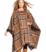 A statement-making topper gives any outfit -- from jeans to a pencil skirt and heels -- added drama! MICHAEL Michael Kors' sweeping poncho features a classic plaid pattern for an elegant look.