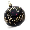 Add DKNY's signature city chic to the tree with this festive holiday ornament, handmade and hand-painted in Poland.